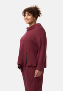 'Vigna' tunic — struchtúrtha cadás-streach agus gearradh sofaisticiúil